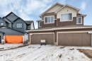 View of front of property with an attached garage and a shingled roof - 5657 Hawthorn Way, Edmonton, AB  - Outdoor 
