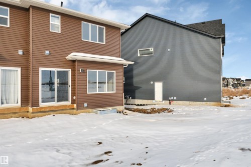 View of snow covered rear of property - 5657 Hawthorn Way, Edmonton, AB - Outdoor