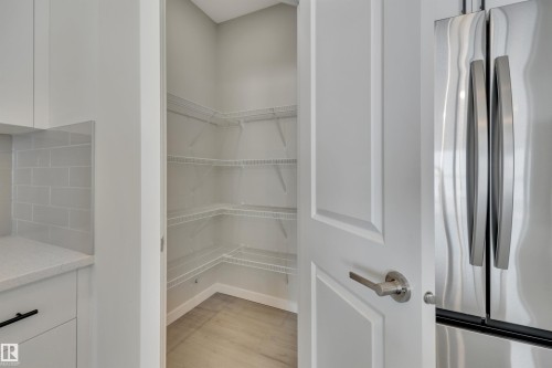 View of pantry - 5657 Hawthorn Way, Edmonton, AB - Indoor With Storage