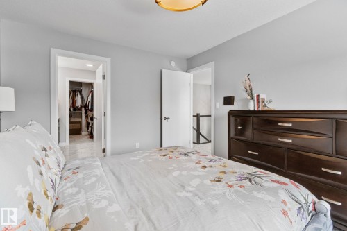 Bedroom featuring a spacious closet - 324 41 Street, Edmonton, AB - Indoor Photo Showing Bedroom