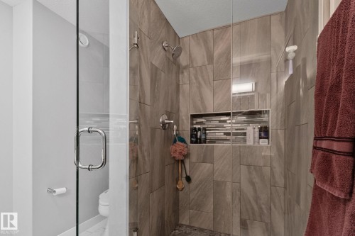 Bathroom with toilet and a shower stall - 324 41 Street, Edmonton, AB - Indoor Photo Showing Bathroom