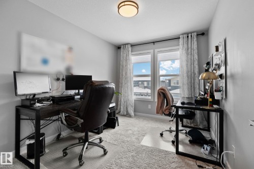Bedroom featuring light colored carpet and baseboards - 324 41 Street, Edmonton, AB - Indoor Photo Showing Office