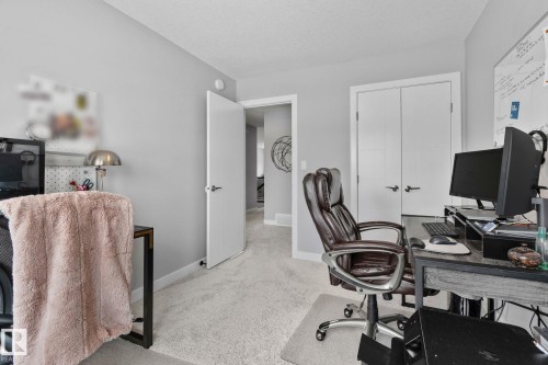 Bedroom featuring light colored carpet and a textured ceiling - 324 41 Street, Edmonton, AB - Indoor Photo Showing Office