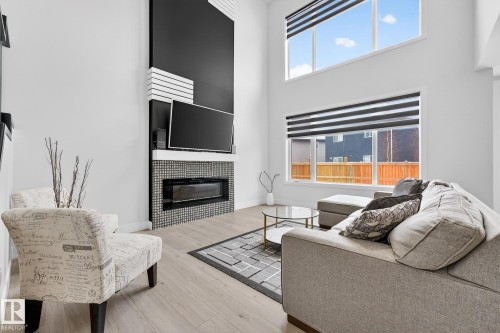 4413 39 Street, Beaumont, AB - Indoor Photo Showing Living Room With Fireplace
