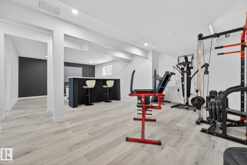 4413 39 Street, Beaumont, AB - Indoor Photo Showing Gym Room