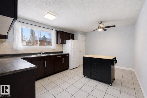 Items Removed with AI - 41 Alpine Boulevard, St. Albert, AB - Indoor Photo Showing Kitchen With Double Sink