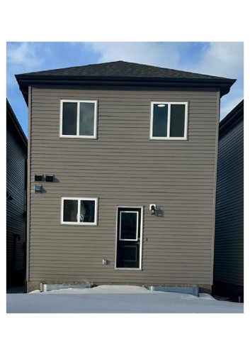 View of snow covered rear of property - 231 25 Street Sw, Edmonton, AB - Outdoor With Exterior