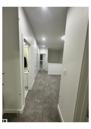 Hall with carpet floors and recessed lighting - 231 25 Street Sw, Edmonton, AB - Indoor Photo Showing Other Room
