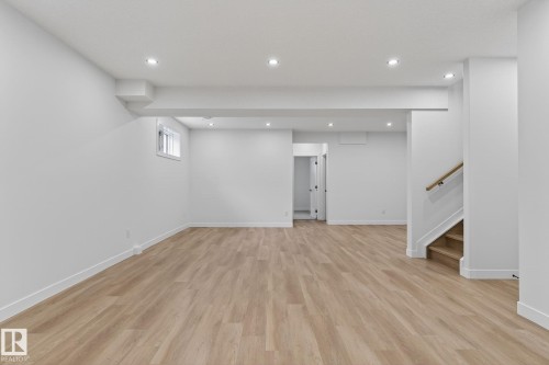 Basement featuring light wood finished floors and recessed lighting - 3318 Chickadee Drive, Edmonton, AB - Indoor Photo Showing Other Room