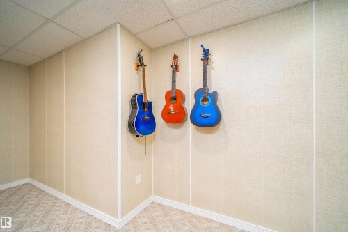 Detailed view of a drop ceiling - 1179 Oakland Drive, Devon, AB - Indoor Photo Showing Other Room