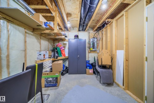 Unfinished basement featuring electric panel - 1179 Oakland Drive, Devon, AB - Indoor Photo Showing Basement