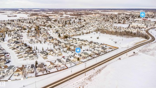 View of snowy aerial view - 1179 Oakland Drive, Devon, AB - Outdoor With View