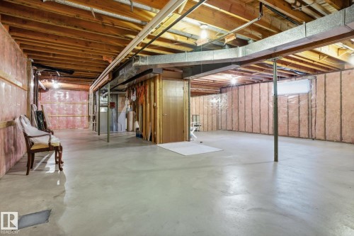 Unfinished basement with heating unit - 65 Lorne Crescent, St. Albert, AB - Indoor Photo Showing Basement