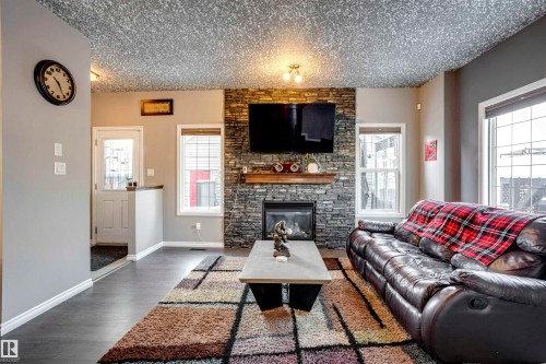 3351 Weidle Way, Edmonton, AB - Indoor Photo Showing Living Room With Fireplace