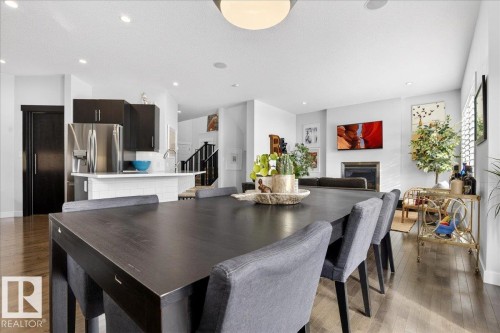 21937 94A Avenue, Edmonton, AB - Indoor Photo Showing Dining Room With Fireplace