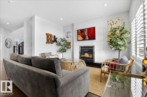 21937 94A Avenue, Edmonton, AB - Indoor Photo Showing Living Room With Fireplace