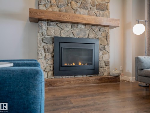 289 Hawks Ridge Boulevard, Edmonton, AB - Indoor Photo Showing Living Room With Fireplace