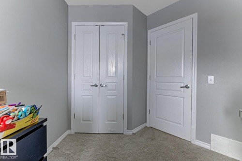 937 Crystallina Nera Way, Edmonton, AB - Indoor Photo Showing Other Room