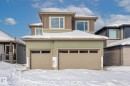 View of front facade featuring an attached garage - 28 Harley Way, Spruce Grove, AB  - Outdoor 