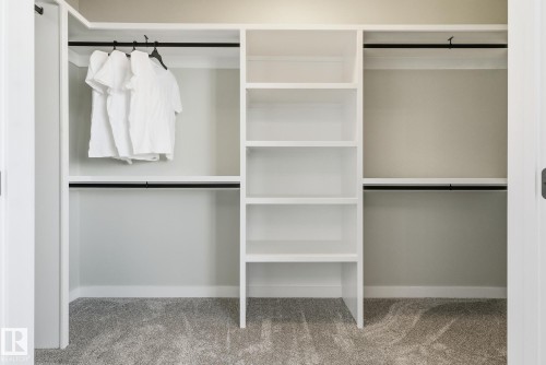 View of closet - 28 Harley Way, Spruce Grove, AB - Indoor With Storage