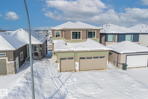 View of front facade featuring an attached garage - 28 Harley Way, Spruce Grove, AB - Outdoor With Facade