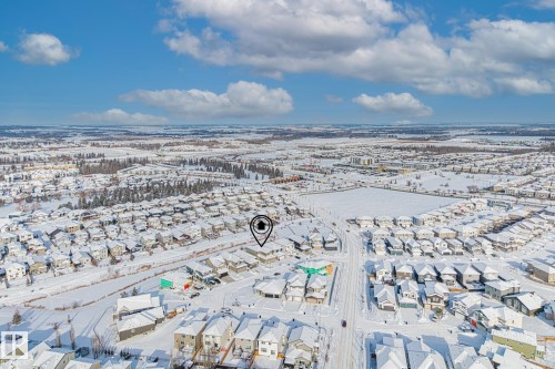 Aerial perspective of suburban area - 28 Harley Way, Spruce Grove, AB - Outdoor With View
