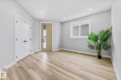 Entryway featuring light wood-style flooring and recessed lighting - 28 Harley Way, Spruce Grove, AB - Indoor Photo Showing Other Room