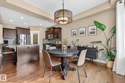 Dining area featuring light wood-type flooring and recessed lighting - 21 Dittrich, Fort Saskatchewan, AB - Indoor Photo Showing Dining Room