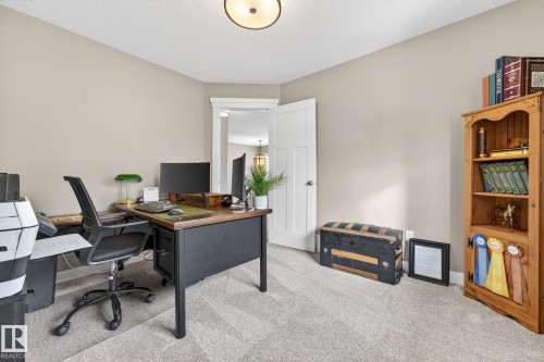 Home office with carpet floors - 21 Dittrich, Fort Saskatchewan, AB - Indoor Photo Showing Office