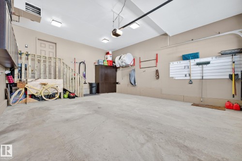 Garage with a heating unit - 21 Dittrich, Fort Saskatchewan, AB - Indoor Photo Showing Garage