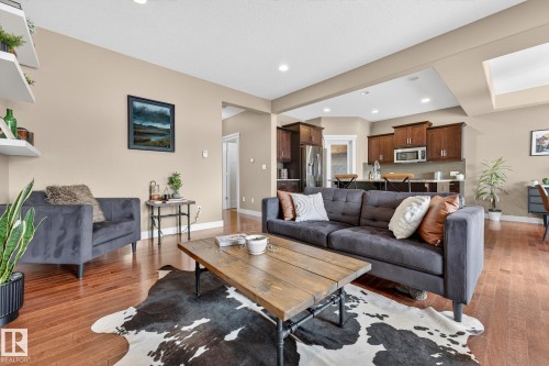 Living room featuring light wood finished floors and recessed lighting - 21 Dittrich, Fort Saskatchewan, AB - Indoor Photo Showing Living Room