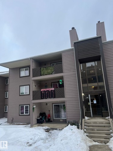 Snow covered property featuring a view of apartment building / complex - 302 49 Akins Drive, St. Albert, AB - Outdoor With Balcony