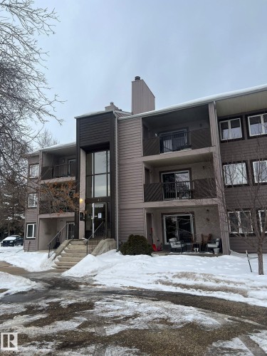 Snow covered building with a view of apartment building / complex - 302 49 Akins Drive, St. Albert, AB - Outdoor With Balcony