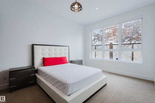 Bedroom with carpet flooring and recessed lighting - 6307 125 Street, Edmonton, AB - Indoor Photo Showing Bedroom