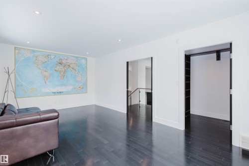 Living area featuring dark wood-style flooring and recessed lighting - 6307 125 Street, Edmonton, AB - Indoor Photo Showing Other Room