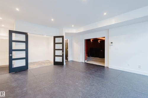 Empty room featuring french doors and recessed lighting - 6307 125 Street, Edmonton, AB - Indoor Photo Showing Other Room