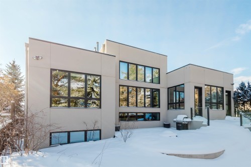 Snow covered house featuring stucco siding - 6307 125 Street, Edmonton, AB - Outdoor