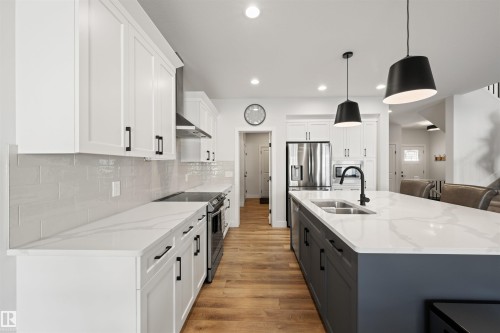 63 Willow Link, Fort Saskatchewan, AB - Indoor Photo Showing Kitchen With Double Sink With Upgraded Kitchen