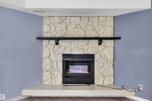 14204 31 Street, Edmonton, AB - Indoor Photo Showing Living Room With Fireplace