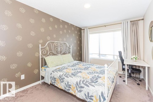 Carpeted bedroom with baseboards and wallpapered walls - 3128 13 Avenue, Edmonton, AB - Indoor Photo Showing Bedroom