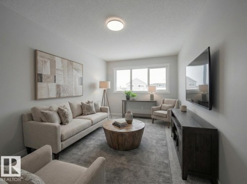 86 Baker Street, Ardrossan, AB - Indoor Photo Showing Living Room