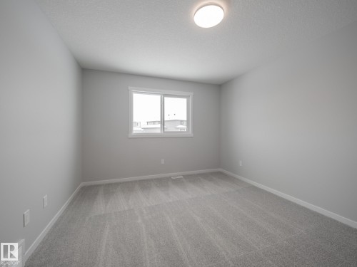 86 Baker Street, Ardrossan, AB - Indoor Photo Showing Other Room