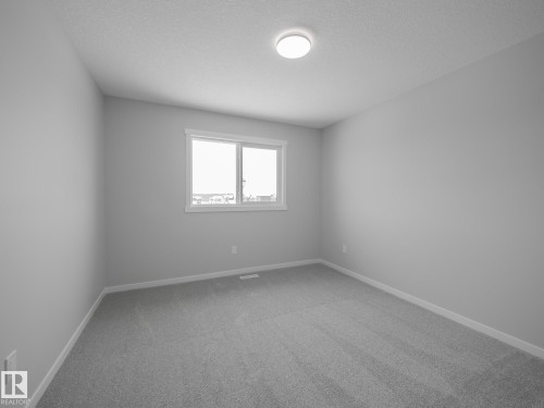 86 Baker Street, Ardrossan, AB - Indoor Photo Showing Other Room
