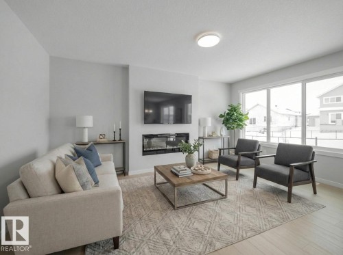 86 Baker Street, Ardrossan, AB - Indoor Photo Showing Living Room With Fireplace