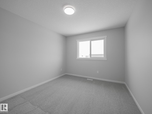 86 Baker Street, Ardrossan, AB - Indoor Photo Showing Other Room