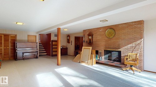 13 Valleyview Crescent, Edmonton, AB - Indoor Photo Showing Other Room With Fireplace