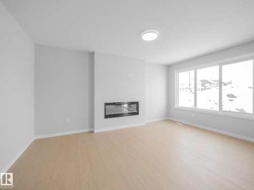 348 172 Avenue, Edmonton, AB - Indoor Photo Showing Living Room With Fireplace