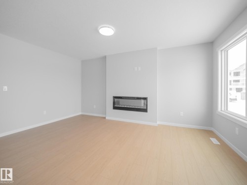 348 172 Avenue, Edmonton, AB - Indoor Photo Showing Other Room With Fireplace