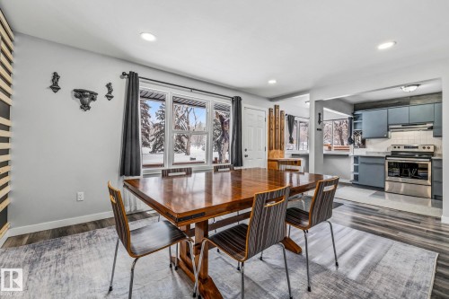 Dining room featuring dark wood-style flooring and recessed lighting - 5911 119 Avenue, Edmonton, AB - Indoor Photo Showing Dining Room