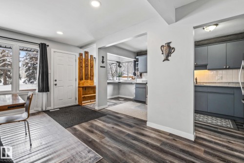 Entrance foyer with dark wood-style flooring, recessed lighting, and healthy amount of natural light - 5911 119 Avenue, Edmonton, AB - Indoor Photo Showing Other Room